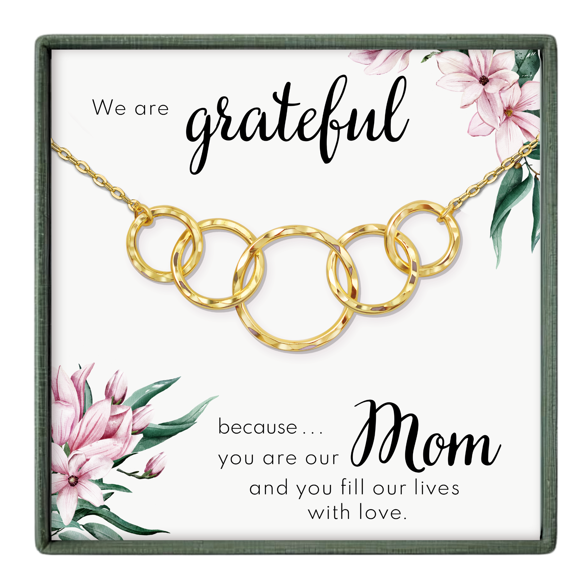 The image is a necklace with a pendant that says "We are grateful because... Mom" and features a floral design.