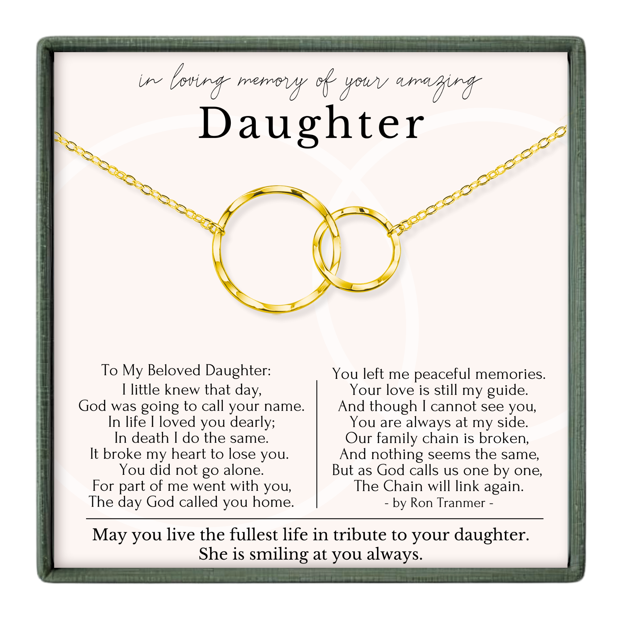 a heartfelt tribute to a daughter, expressing love and memories of her. The tribute includes a necklace with two gold rings, symbolizing the bond between the daughter and her mother. The text is a poem that expresses the love and memories shared between the two, and it is a tribute to the daughter's life and the impact she has had on her mother.