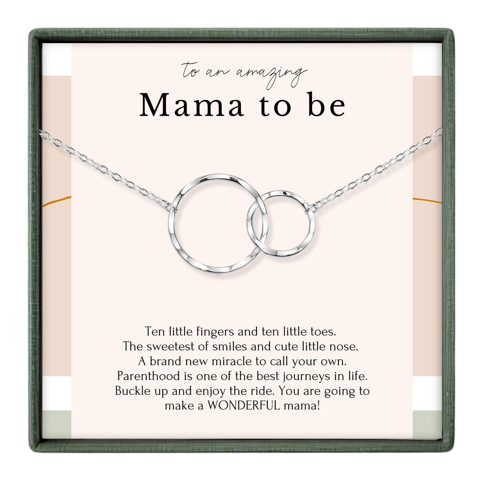 a necklace with two circular pendants, and there is a message written in a box that reads "To an amazing Mama to be".