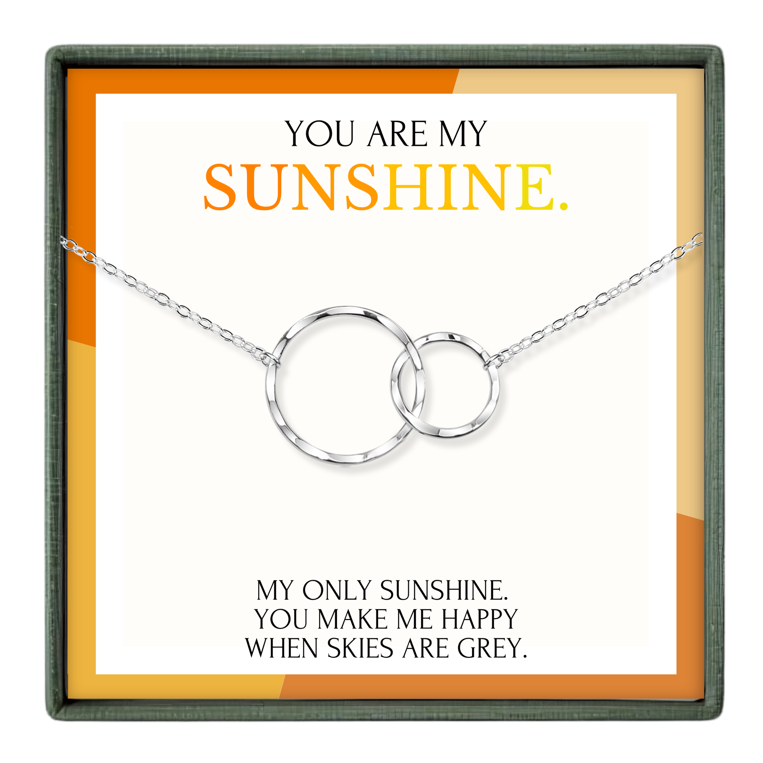 The image is a necklace with two silver rings, accompanied by a message that reads "You are my sunshine. My only sunshine, you make me happy when skies are grey."