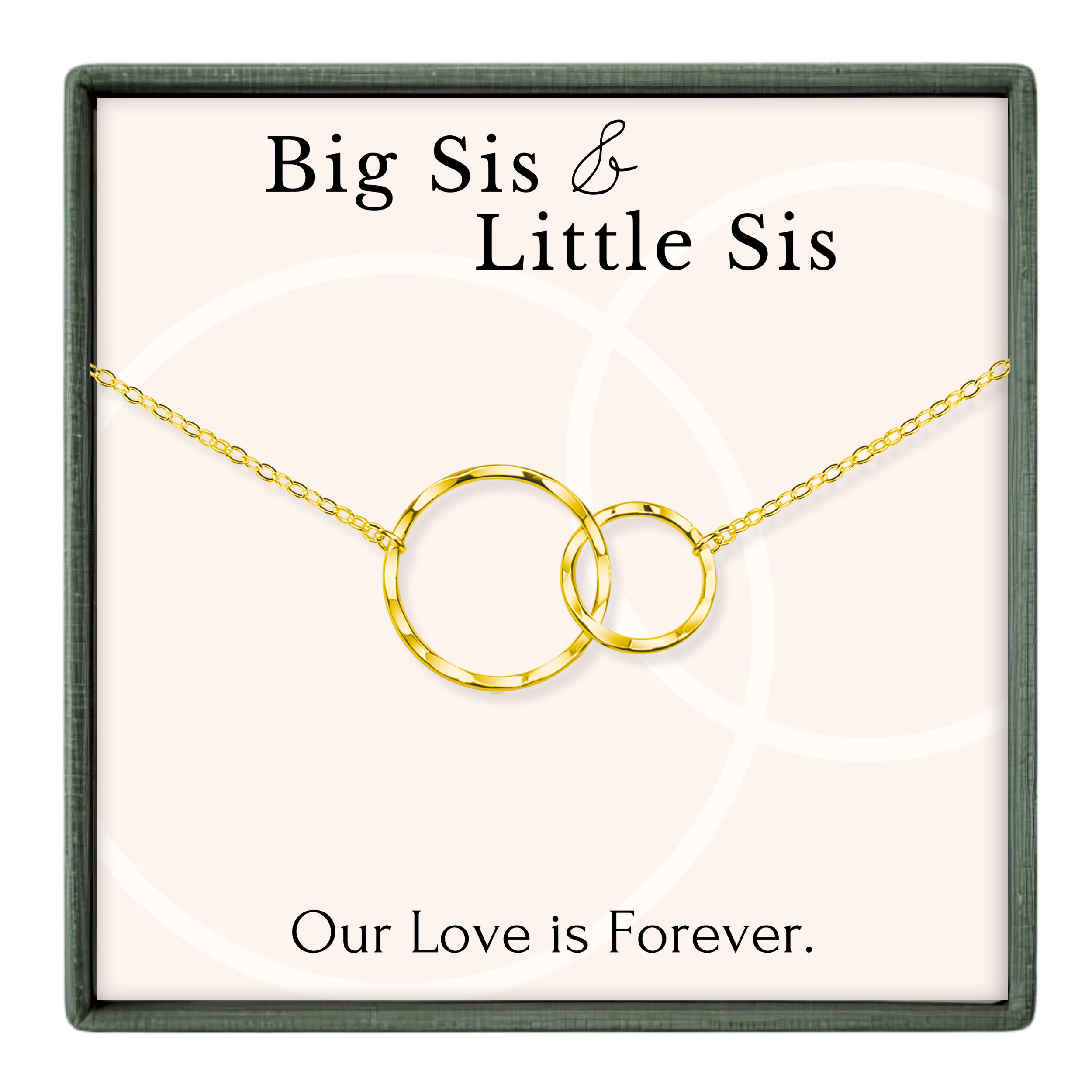 a necklace with two gold-colored circles, and there is text that reads "Big Sis & Little Sis" and "Our Love is Forever."
