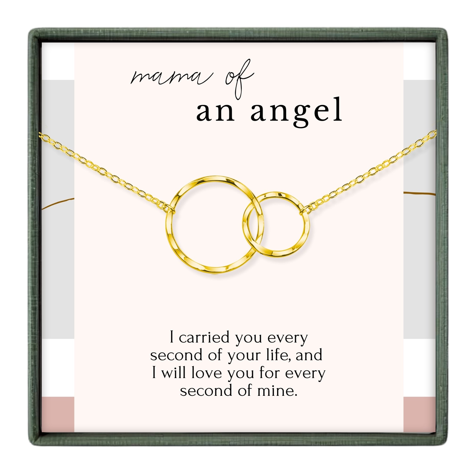 a necklace with two gold-colored circles, and there is a message written in black text above the necklace.