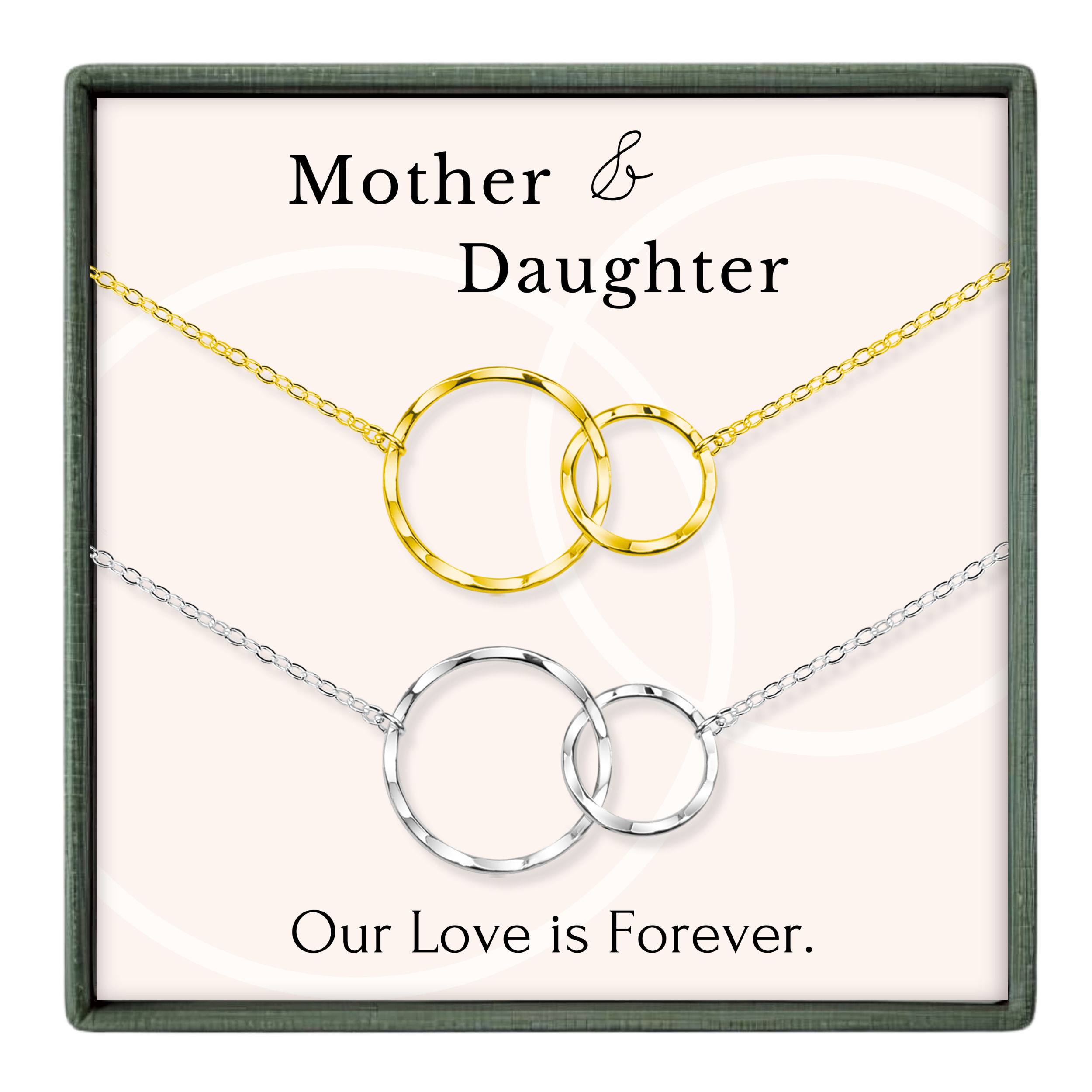 a necklace with two circular pendants, one gold and one silver, set against a light pink background. The text above the necklace reads "Mother & Daughter" and below the necklace, it says "Our Love is Forever."