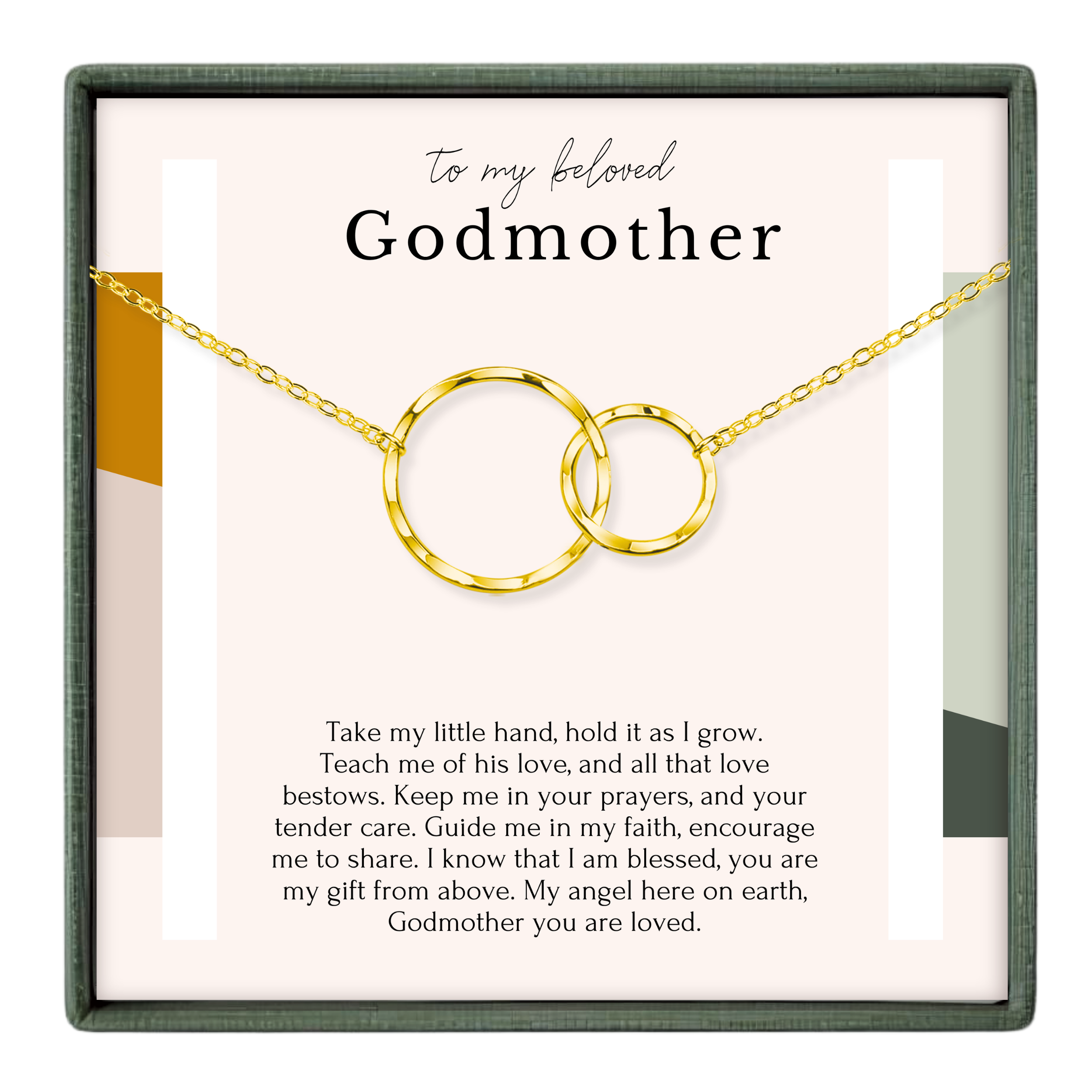 a necklace with two gold-colored rings, and there is a message written in a black font above the necklace.