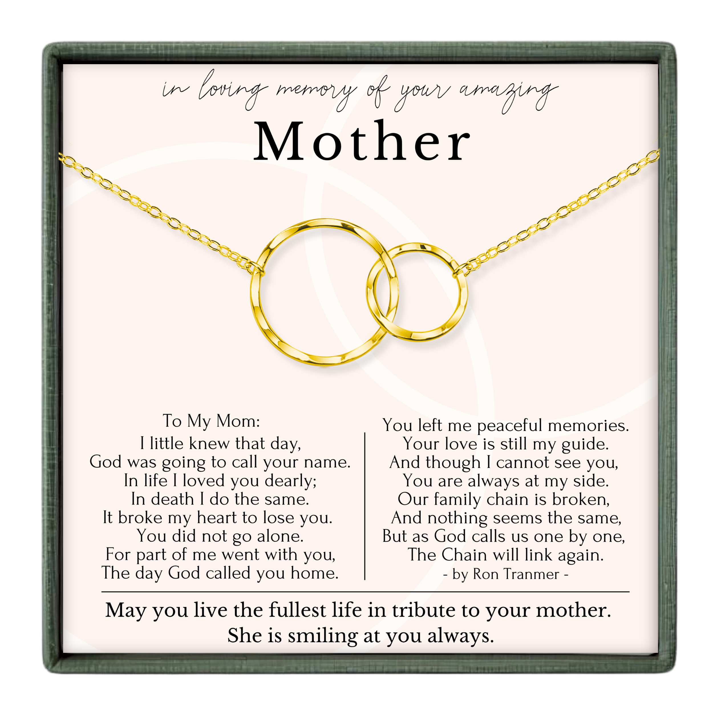 The image is a memorial box for a mother, containing a necklace with two gold rings and a heartfelt poem expressing love and remembrance.