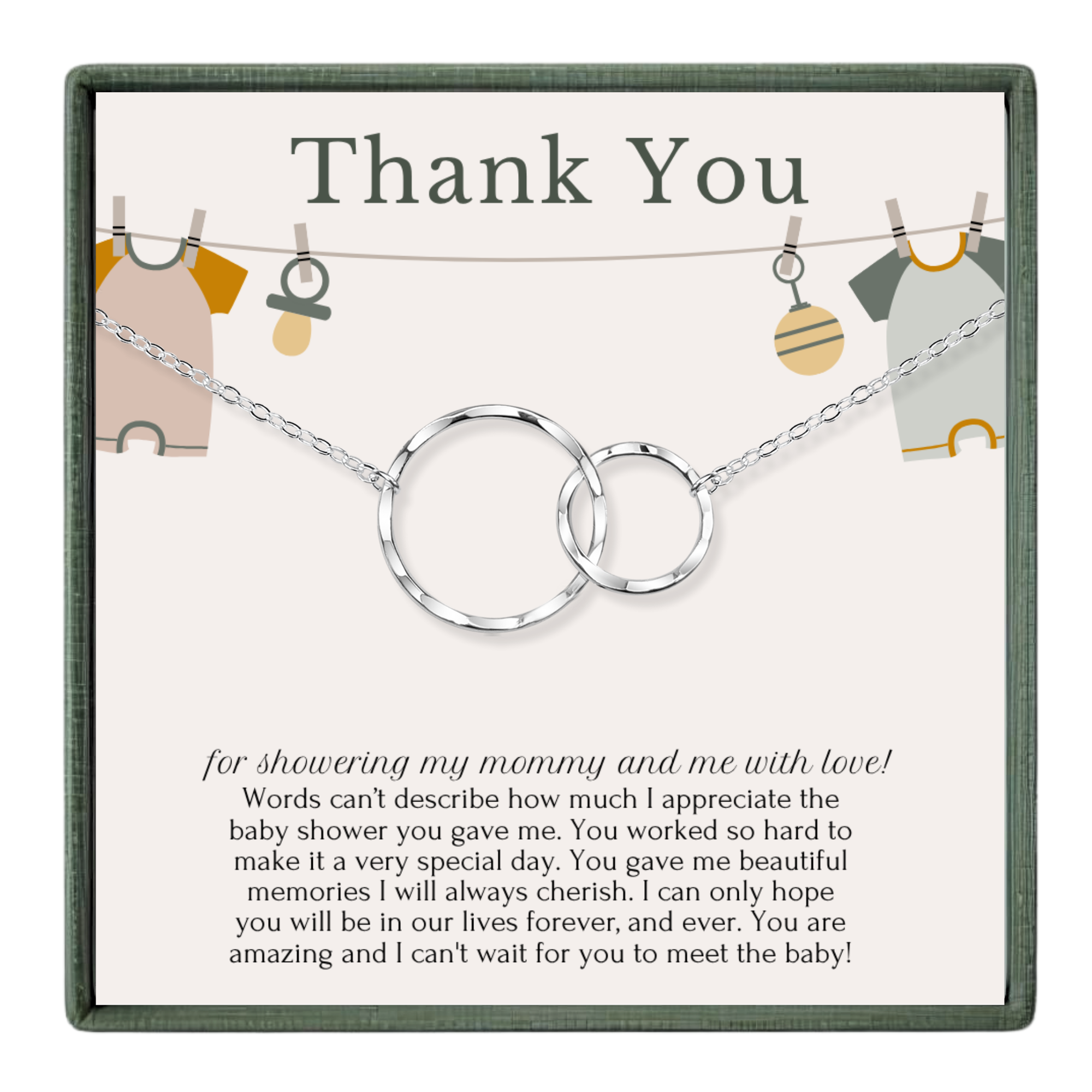 The image is a gift card for a baby shower, featuring a necklace with a baby-themed charm and a heartfelt message expressing gratitude for the baby shower gift.