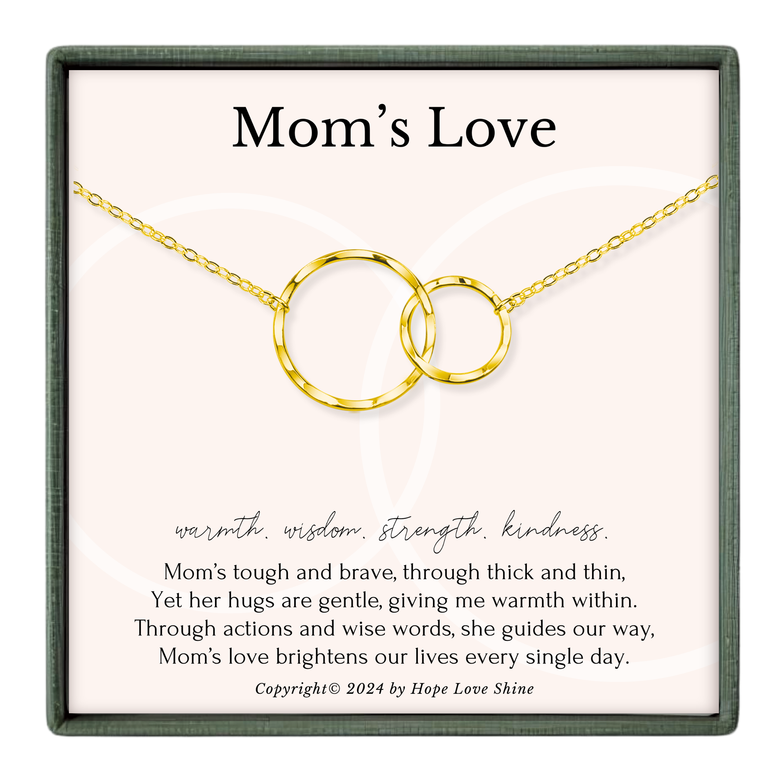 a necklace with two interlocking gold rings, accompanied by a heartfelt message about the love and strength of a mother.