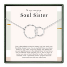 The image is a necklace with two interlocking silver rings, accompanied by a heartfelt message about the importance of a soul sister.