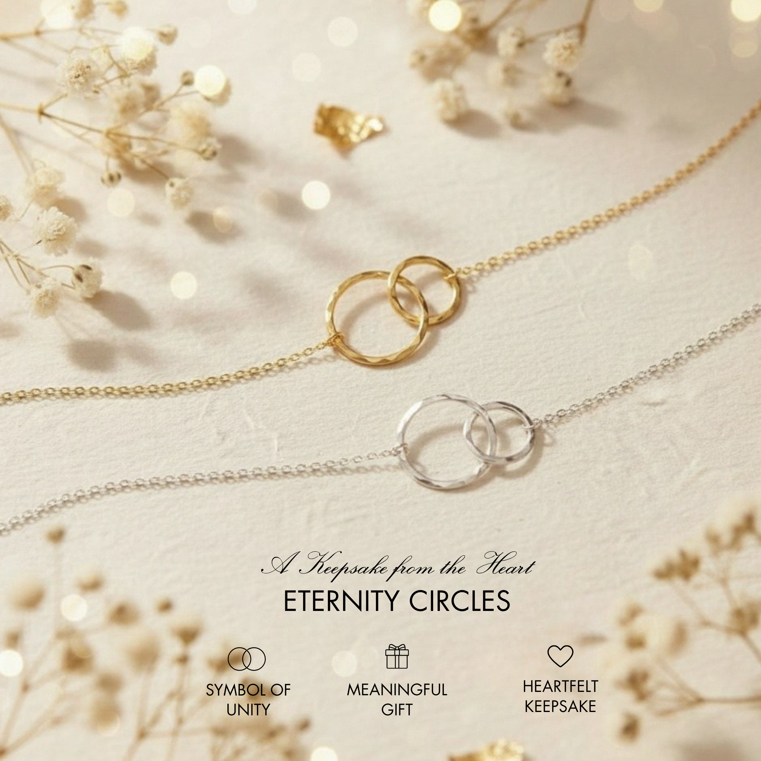a necklace with two intertwined rings, symbolizing the connection between two hearts. The necklace is displayed on a white background, with delicate white flowers and a blurred background, creating a serene and elegant atmosphere.