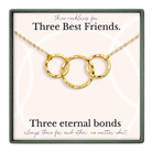 a necklace with three circular gold rings, each ring connected to the other, creating a unique and elegant design.