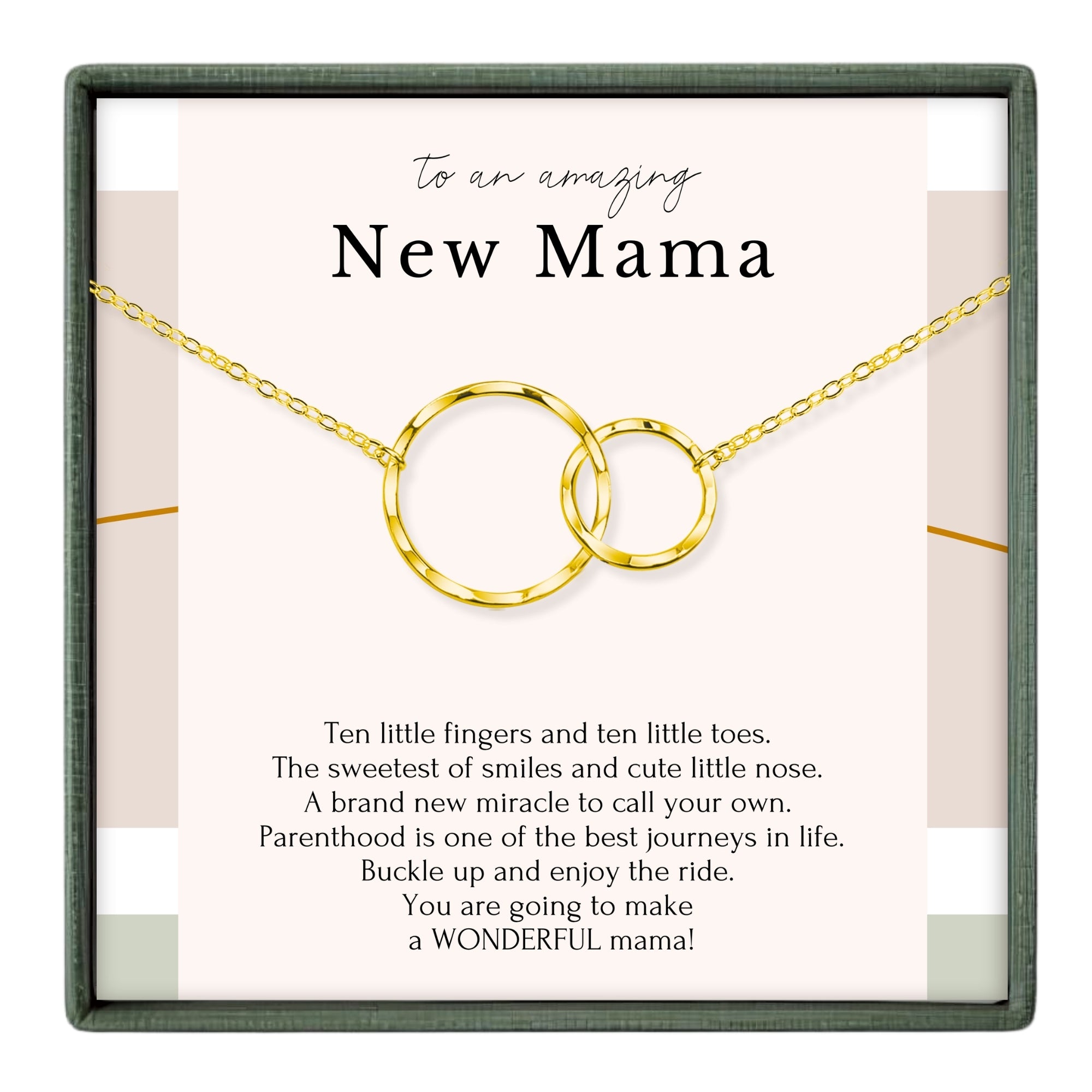 a necklace with two gold-colored rings, accompanied by a heartfelt message about the joys and challenges of motherhood.