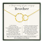 The image is a memorial box for a brother, containing a gold chain with two interlocking rings and a heartfelt poem expressing love and remembrance.