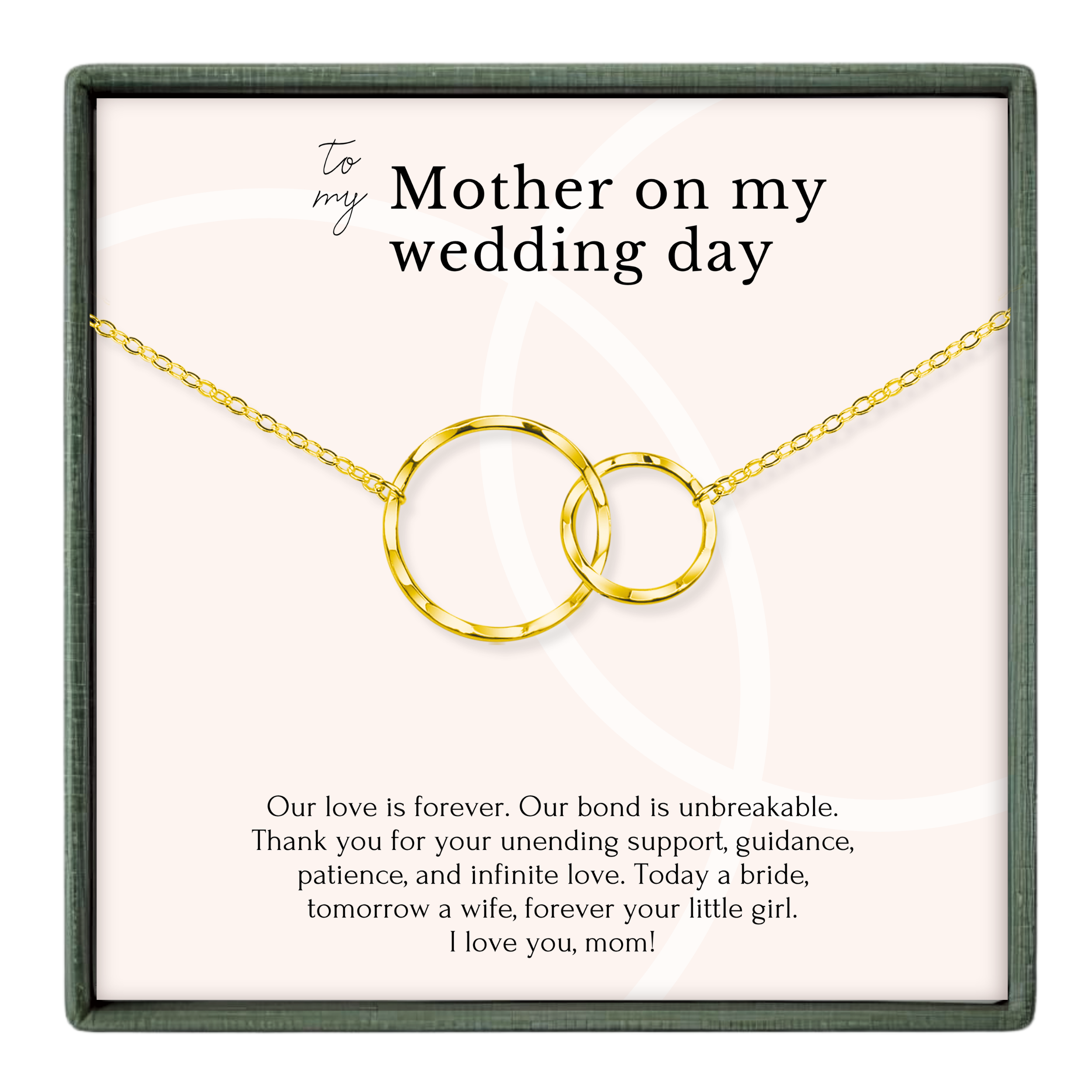 The image is a necklace with two interlocking gold rings, presented in a gift box with a heartfelt message for a mother on her wedding day.