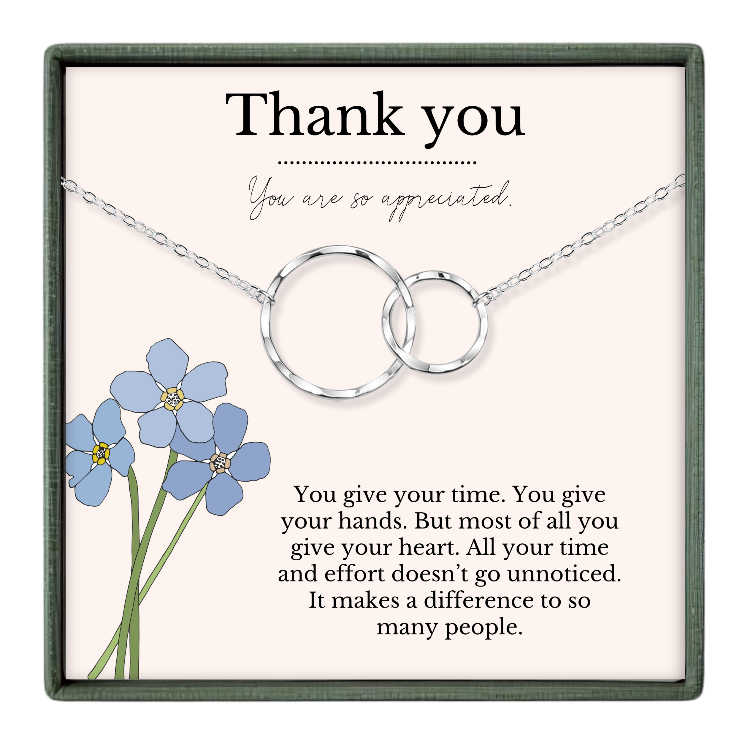 A necklace with two interlocking silver rings, and a bouquet of blue flowers. The text on the necklace reads "Thank you" and "You are so appreciated." The text below the necklace reads "You give your time. You give your hands. But most of all you give your heart. All your time and effort doesn't go unnoticed. It makes a difference to so many people."