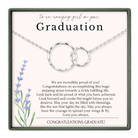 The image is a graduation gift box with a silver necklace and a message congratulating the graduate on their achievement.