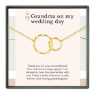 The image is a necklace with two gold rings, and it is presented as a gift to Grandma on her wedding day.