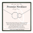 a necklace with two interlocking rings, accompanied by a heartfelt message about the importance of love and commitment.
