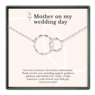 The image is a necklace with two interlocking rings, and it is presented in a square frame. The text on the necklace reads "To my Mother on my wedding day" and expresses love and appreciation for the mother.