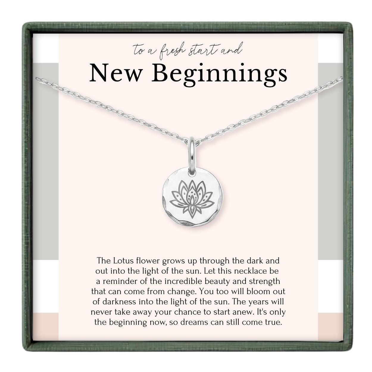 a silver necklace with a round pendant, which is described as a reminder of the incredible beauty and strength that can come from change. The necklace is set against a light pink background, and the text above the necklace reads "To a fresh start and New Beginnings".