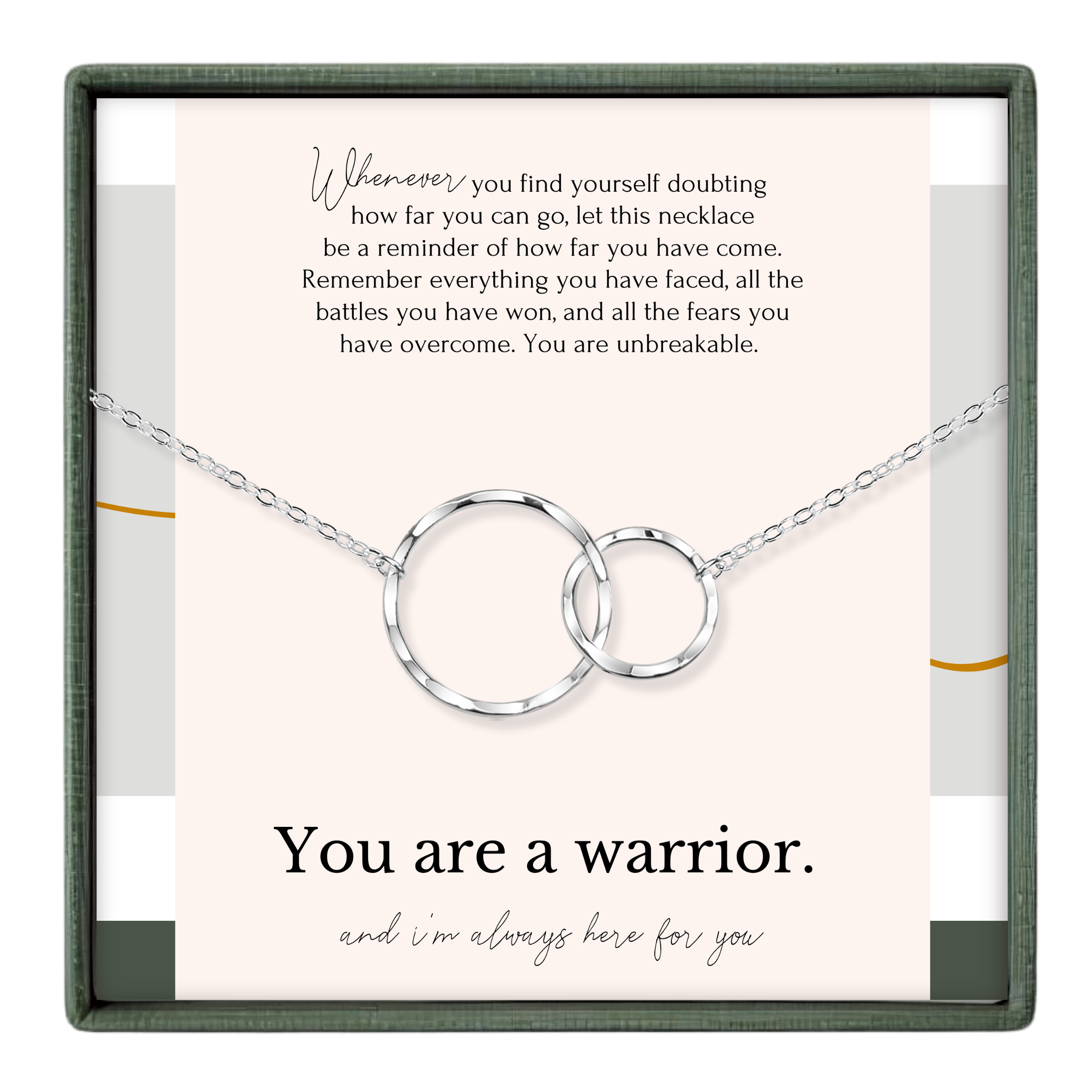 a necklace with two interlocking silver rings, accompanied by a motivational message about being a warrior and always being there for someone.