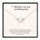 The image is a necklace with a pearl pendant, accompanied by a heartfelt message expressing love and appreciation for the mother on the mother's wedding day.