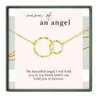 a necklace with two interlocking gold rings, accompanied by a heartfelt message about the mother of an angel.
