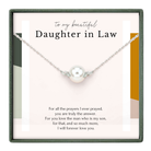 a necklace with a pearl pendant, accompanied by a heartfelt message expressing love and appreciation for the daughter in law.