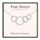 a necklace with a pendant that says "Four Sisters" and "Our Love is Forever."