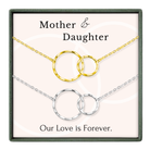 a necklace with two circular pendants, one gold and one silver, set against a light pink background. The text above the necklace reads "Mother & Daughter" and below the necklace, it says "Our Love is Forever."