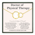 The image is a necklace with two gold rings, and it is presented as a gift to a favorite physical therapist. The text on the necklace reads "Doctor of Physical Therapy" and includes a heartfelt message about the physical therapist's dedication and pride in their profession.