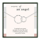 a necklace with two silver rings, accompanied by a heartfelt message about the love and care of a mother.