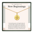 a necklace with a pendant in the shape of a lotus flower, accompanied by a motivational quote about the lotus flower symbolizing new beginnings and the importance of embracing change.