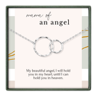 a necklace with two interlocking silver rings, accompanied by a heartfelt message about the mother of an angel.
