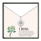 a silver necklace with a pendant, and there is a watercolor illustration of a lotus flower next to it.