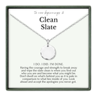 a necklace with a pendant, accompanied by a motivational message about self-improvement and personal growth.