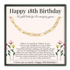 a birthday card with a gold chain necklace