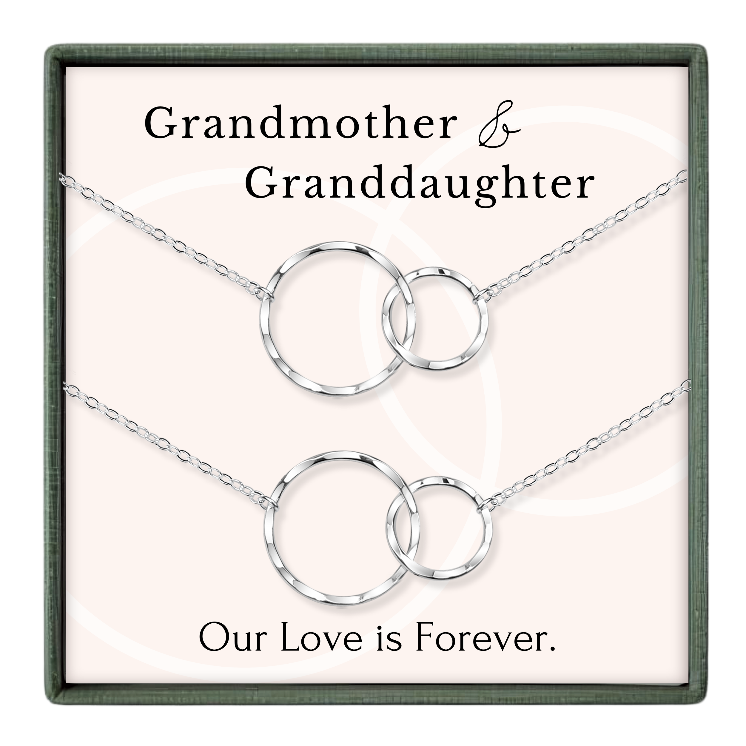 a set of silver necklaces with interlocking circular links, accompanied by the text "Grandmother & Granddaughter" and "Our Love is Forever."
