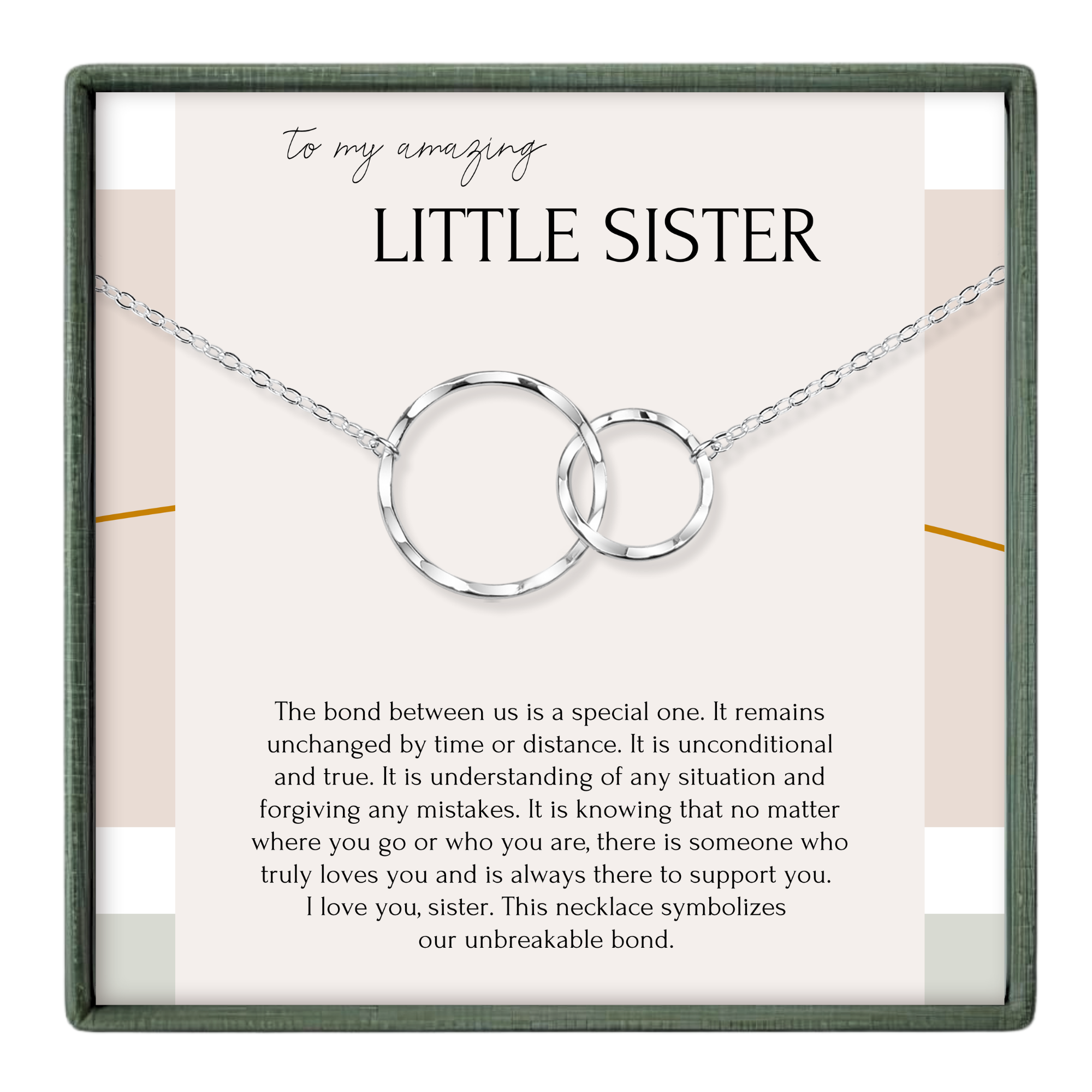 a necklace with two interlocking circular pendants, symbolizing the unbreakable bond between a sister and her sister.