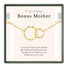 The image is a gift box containing a necklace with two gold rings, accompanied by a heartfelt message expressing gratitude and love for the mother.