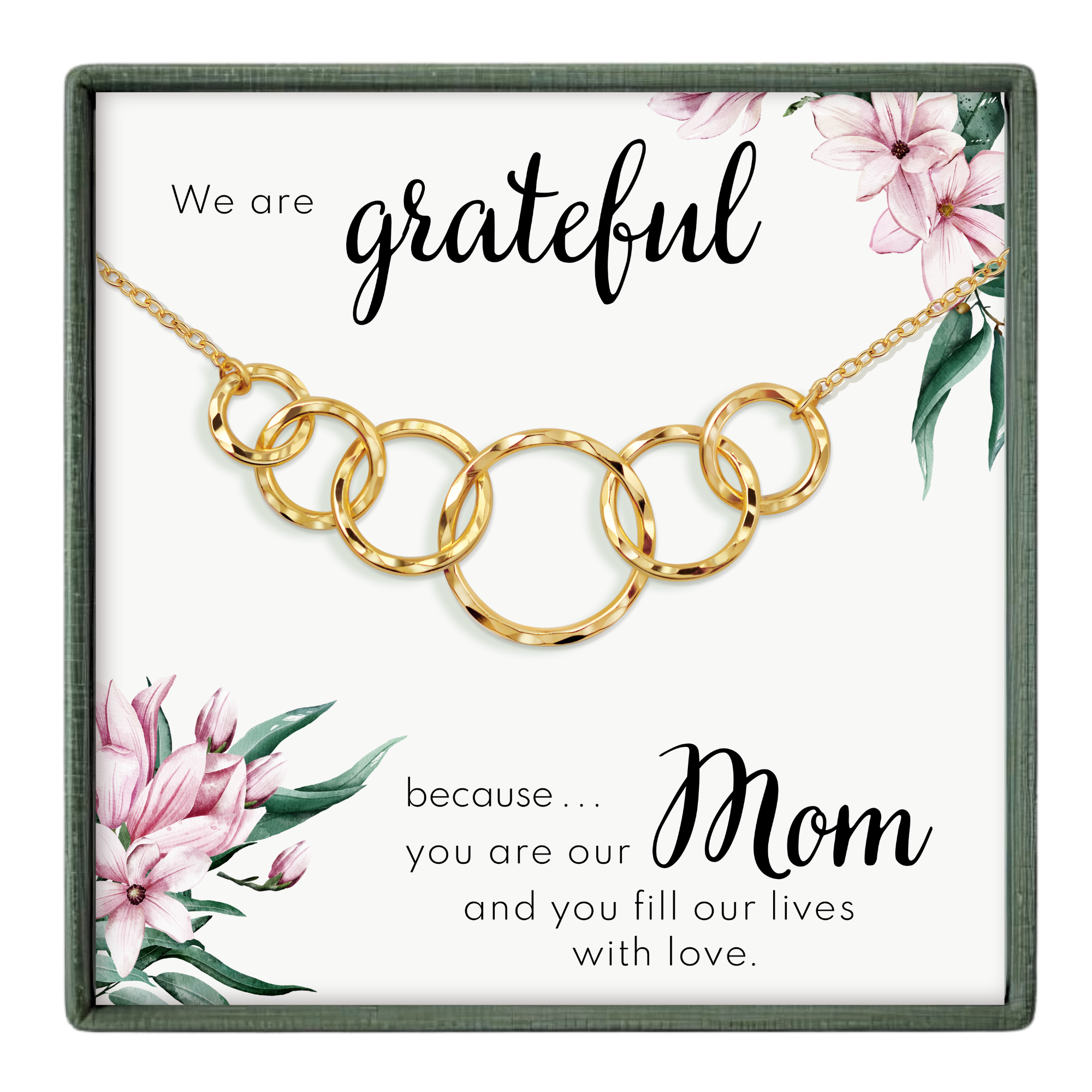 The image is a necklace with a pendant that says "We are grateful because... Mom" and features a floral design.